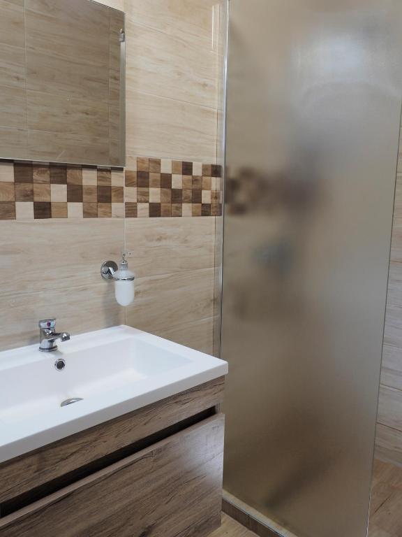 Koupelna v ubytování Rókabérc Vadászház Hotel