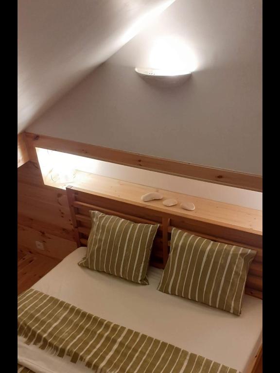 Postel nebo postele na pokoji v ubytování Ocalm gîte B-2h wellness par nuitée