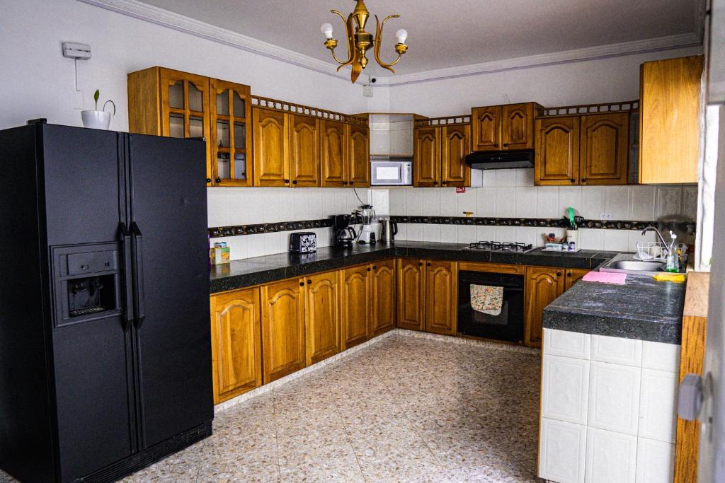 Kuchyň nebo kuchyňský kout v ubytování Lucca Hostel Medellín