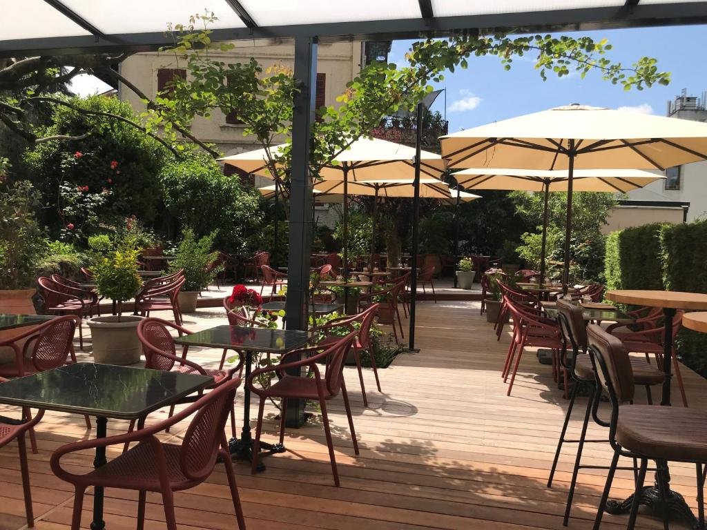 Reštaurácia alebo iné gastronomické zariadenie v ubytovaní Hôtel Gallia