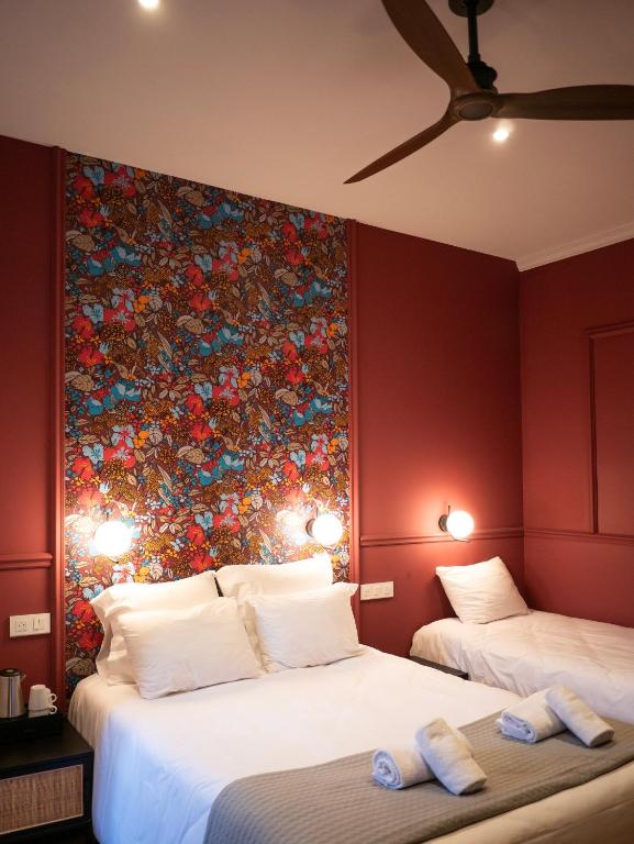 Posteľ alebo postele v izbe v ubytovaní Hôtel Gallia
