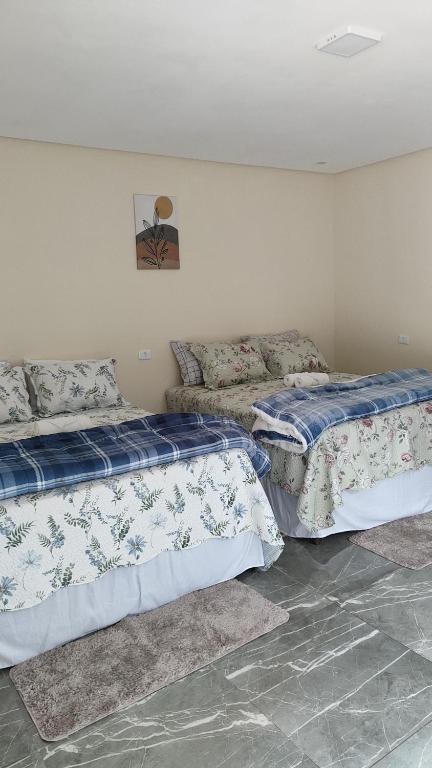 Postel nebo postele na pokoji v ubytování Chalés Boca Da Mata