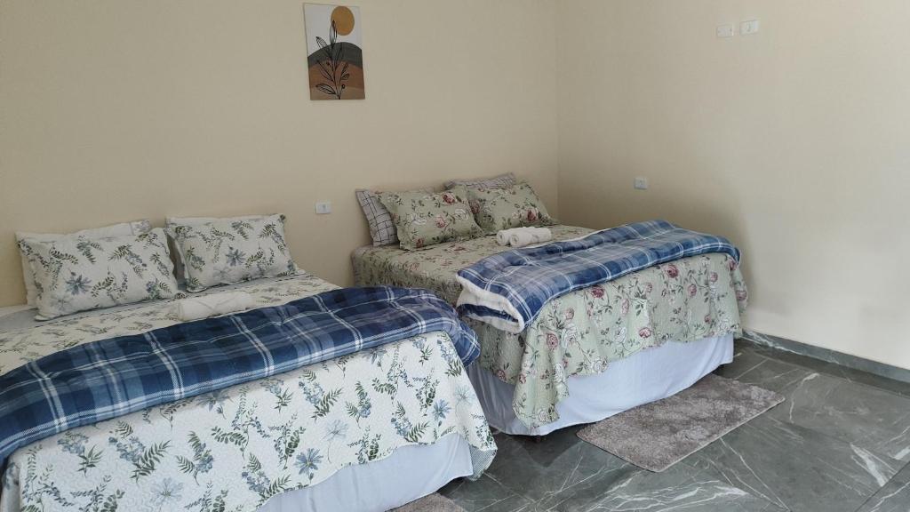 Postel nebo postele na pokoji v ubytování Chalés Boca Da Mata