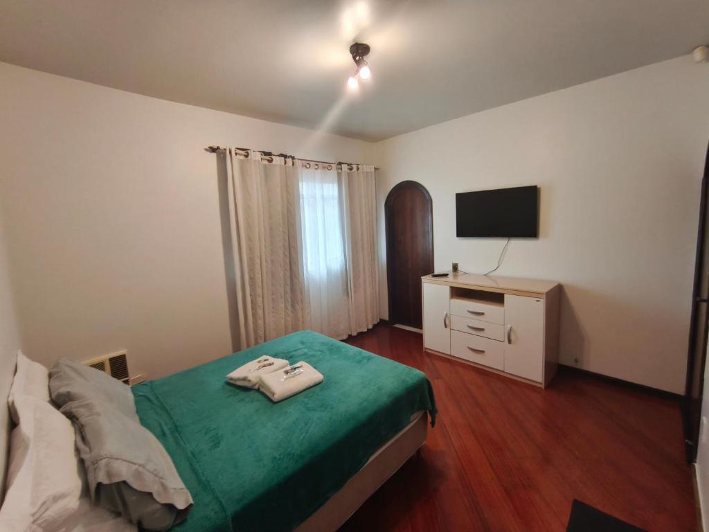 Postel nebo postele na pokoji v ubytování Suite FIRST CLASS - tripla