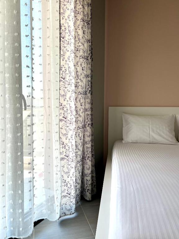 Postel nebo postele na pokoji v ubytování SnappyB Living Spaces