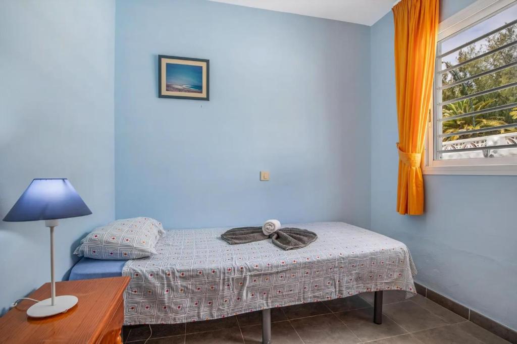 Posteľ alebo postele v izbe v ubytovaní Schöne Wohnung Mit Terrasse In Costa Calma