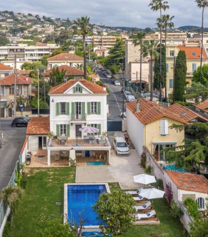 an aerial view of a house with a swimming pool at Villa Acacia in Vallauris