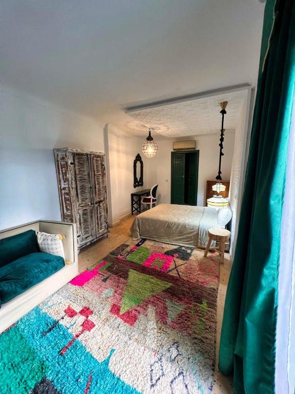 Postel nebo postele na pokoji v ubytování Riad JiL & SPA