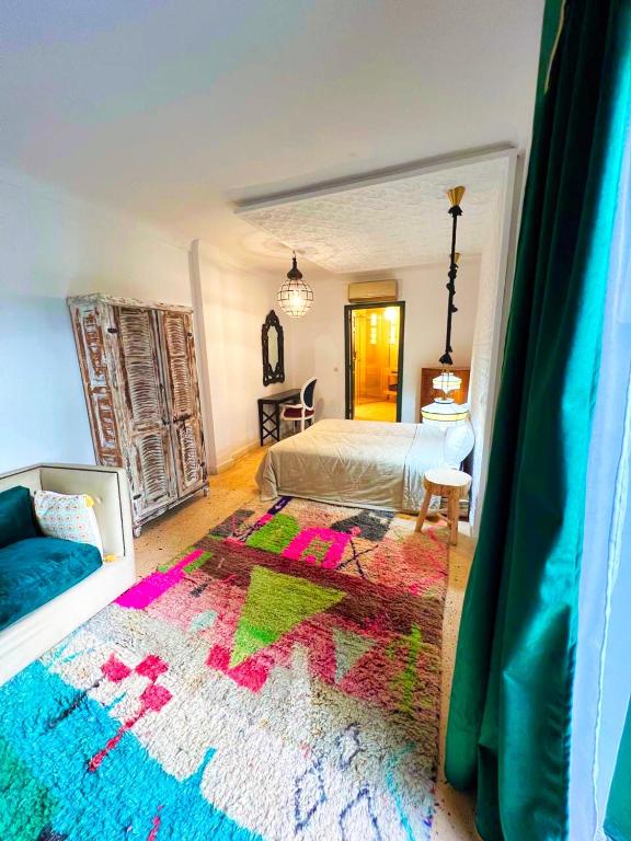 Postel nebo postele na pokoji v ubytování Riad JiL & SPA