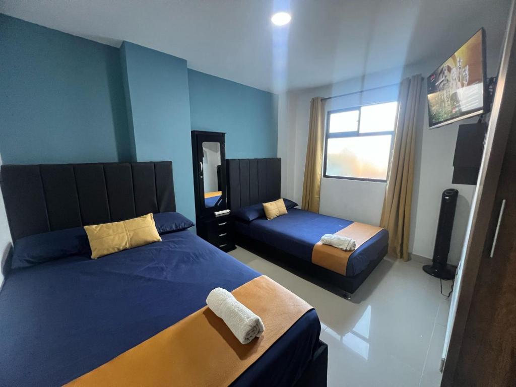 Postel nebo postele na pokoji v ubytování Apartamento Ángel Namaste