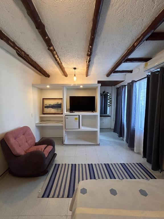 TV a/nebo společenská místnost v ubytování Jerusalén Hotel Boutique