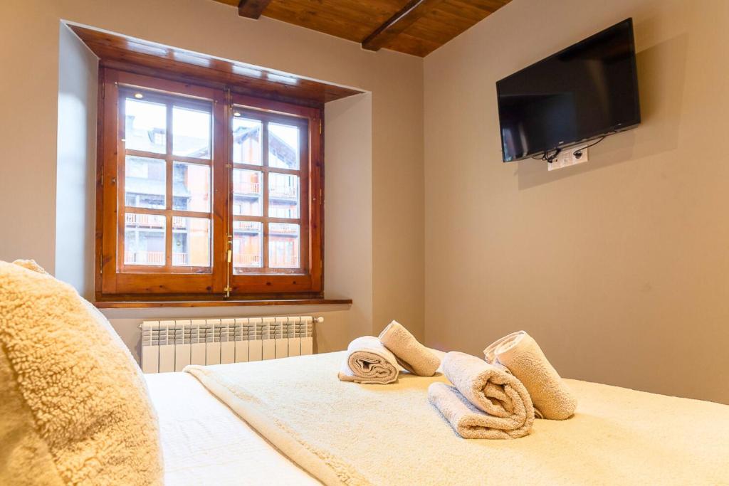 TV a/nebo společenská místnost v ubytování Rústico y Elegante I Estancia con Aparcamiento