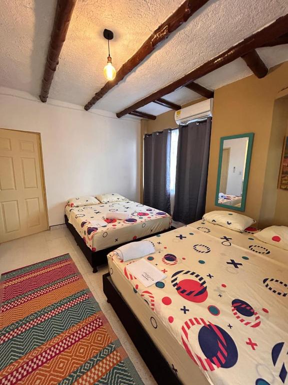 Postel nebo postele na pokoji v ubytování Jerusalén Hotel Boutique