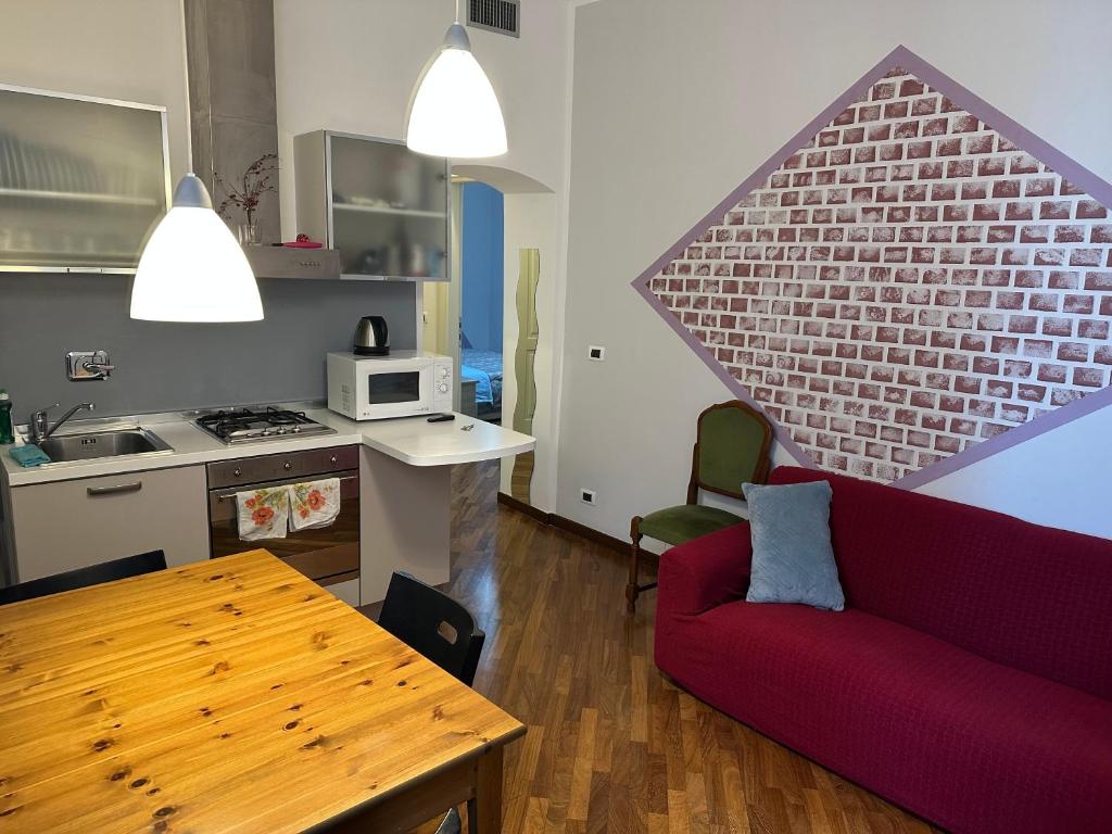 Kuchyň nebo kuchyňský kout v ubytování Room Principe