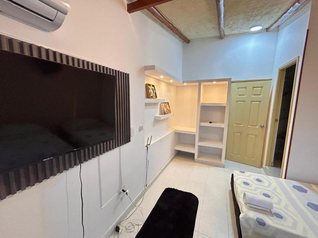 TV a/nebo společenská místnost v ubytování Jerusalén Hotel Boutique