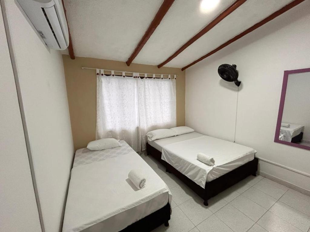 Postel nebo postele na pokoji v ubytování Jerusalén Hotel Boutique