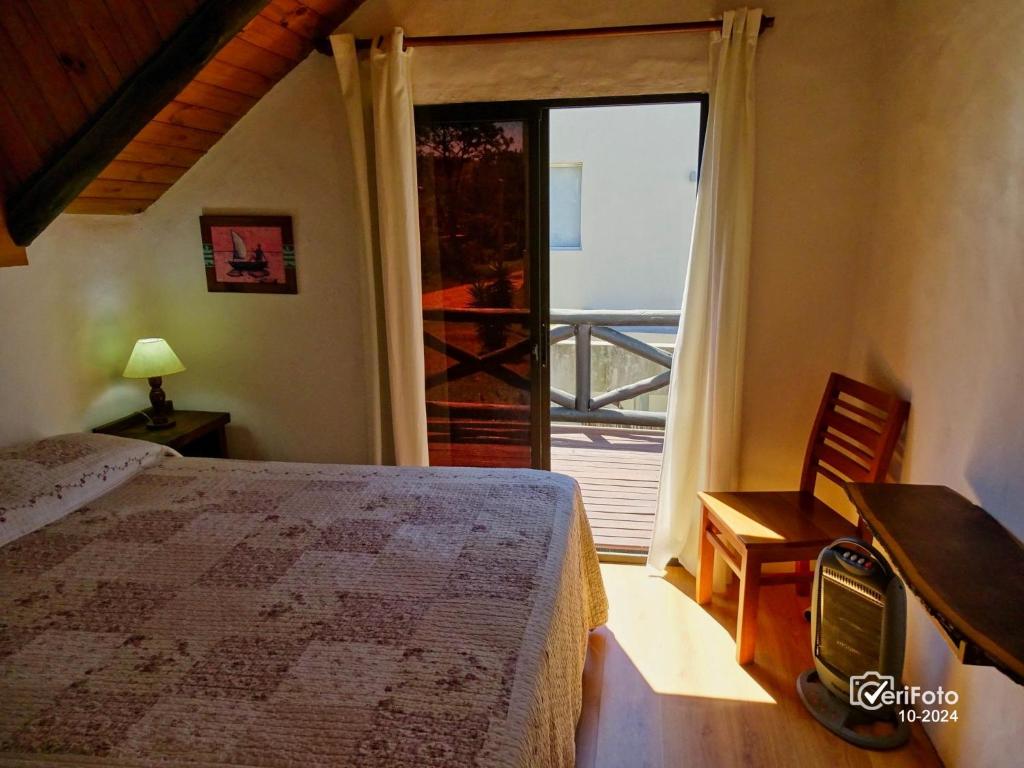 Postel nebo postele na pokoji v ubytování Bungalows Punta Colorada