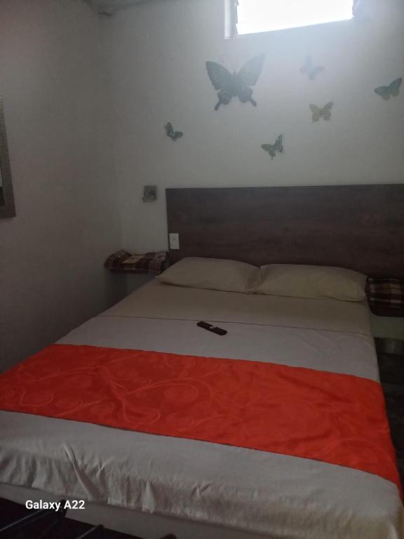 Postel nebo postele na pokoji v ubytování HOTEL DEPARTAMENTAL