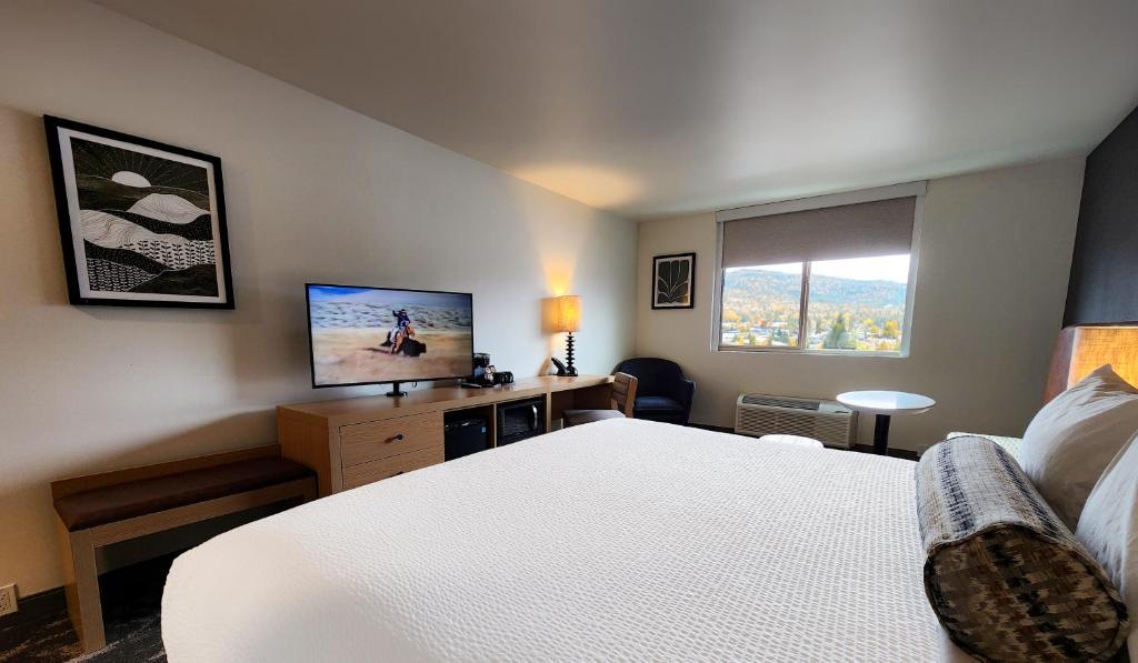 Postel nebo postele na pokoji v ubytování Rayland Hotel