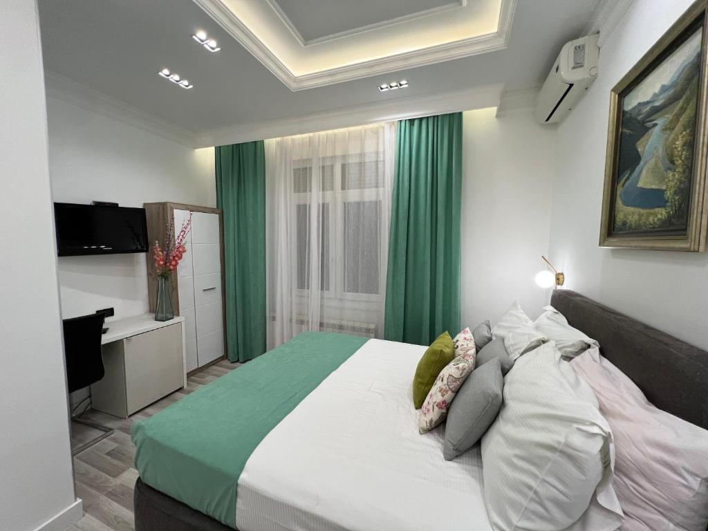 Postel nebo postele na pokoji v ubytování Hotel Forever