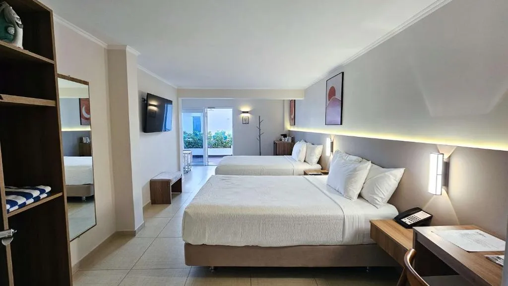 Double Room with Two Double Beds, Pool View and Sofa - Non-Smoking/Adults Only
