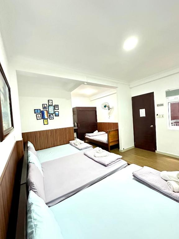 Postel nebo postele na pokoji v ubytování Hotel Đông Nhi