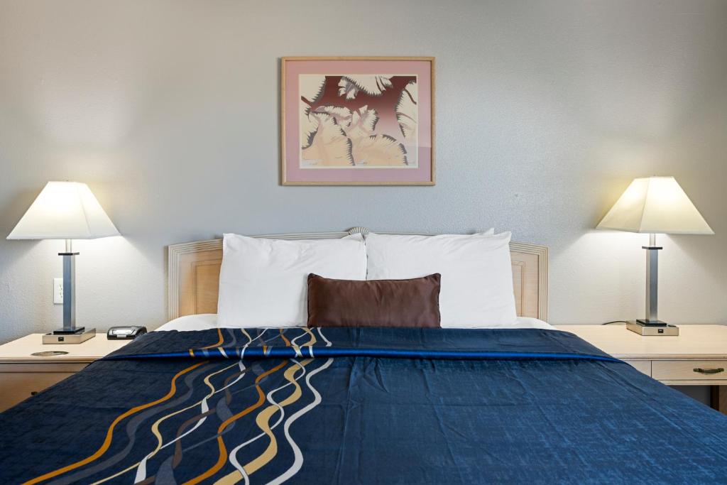 Postel nebo postele na pokoji v ubytování Budget Motel - Delta, Utah