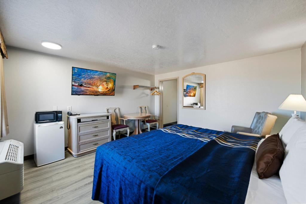Postel nebo postele na pokoji v ubytování Budget Motel - Delta, Utah