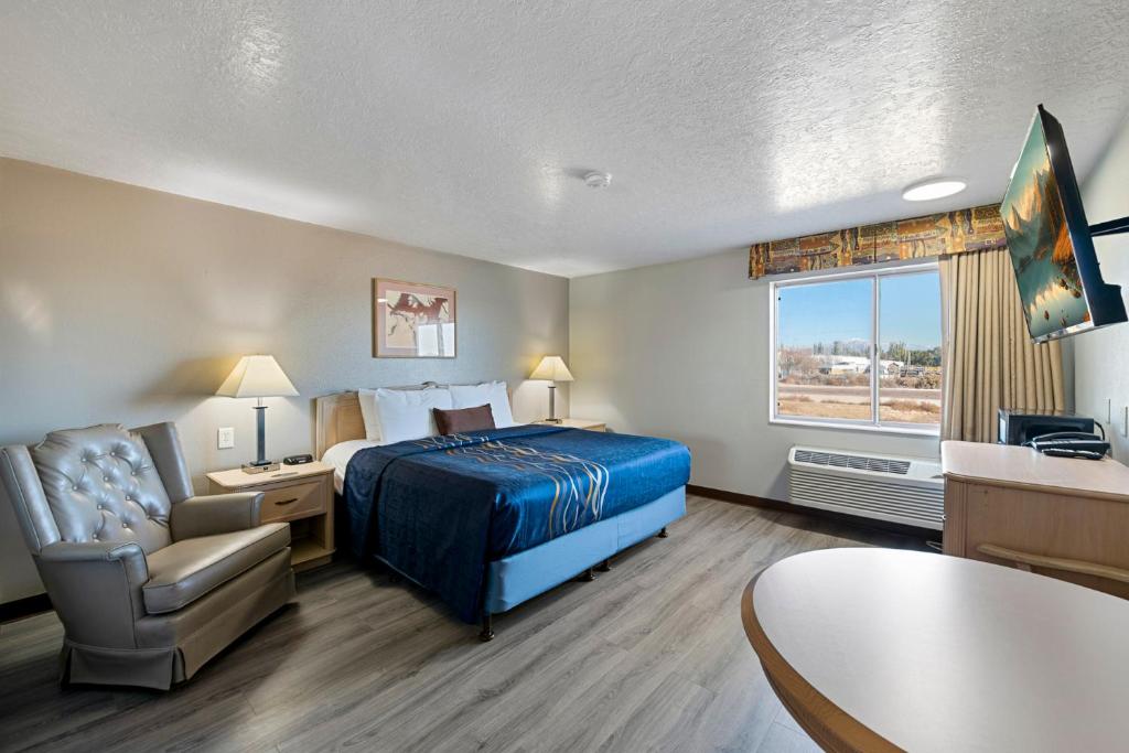 Postel nebo postele na pokoji v ubytování Budget Motel - Delta, Utah