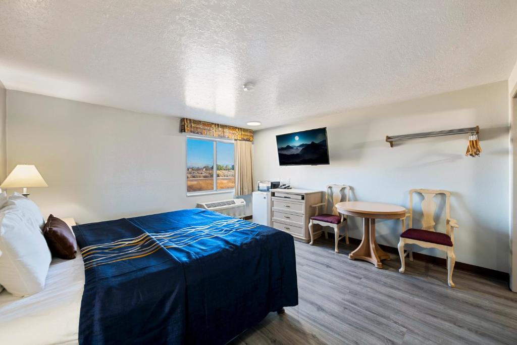 Postel nebo postele na pokoji v ubytování Budget Motel - Delta, Utah