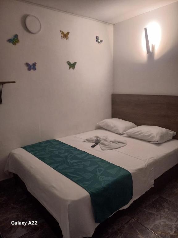 Postel nebo postele na pokoji v ubytování HOTEL DEPARTAMENTAL