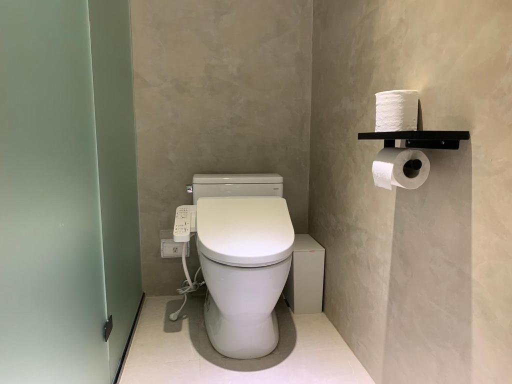 Koupelna v ubytování Burabura Cafe Guesthouse