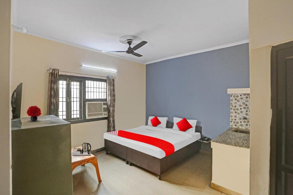 Postel nebo postele na pokoji v ubytování Hotel O Dremland Residency