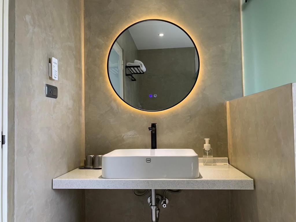 Koupelna v ubytování Burabura Cafe Guesthouse
