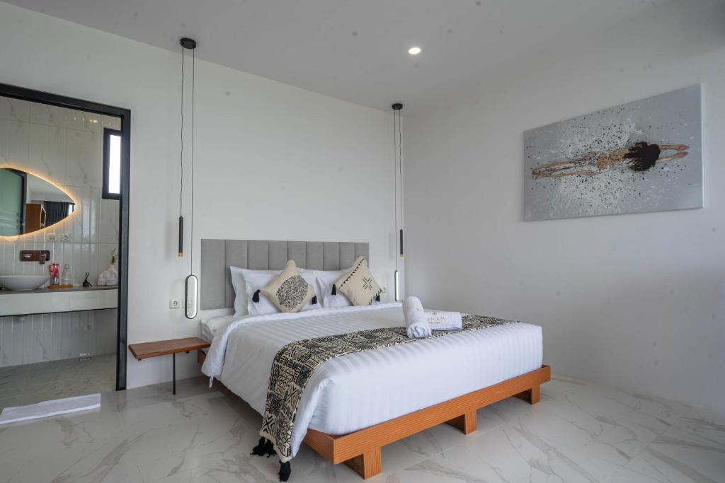 Giường trong phòng chung tại Gandum Villa Complex - Luxury Boutique Stay Uluwatu