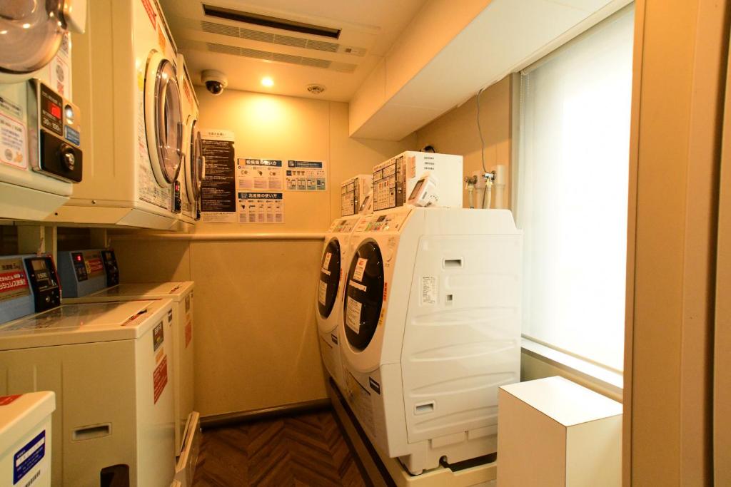 Kuchyň nebo kuchyňský kout v ubytování The Rise Osaka Kitashinchi