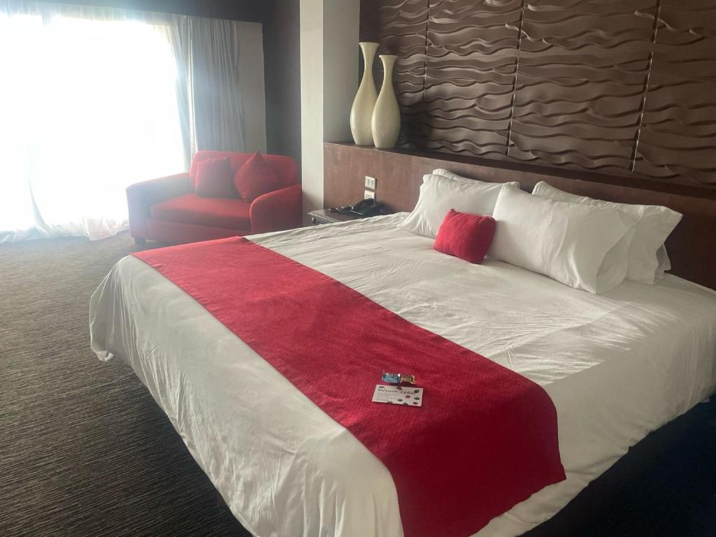 Postel nebo postele na pokoji v ubytování Radisson Hotel Tapatio Guadalajara Aeropuerto