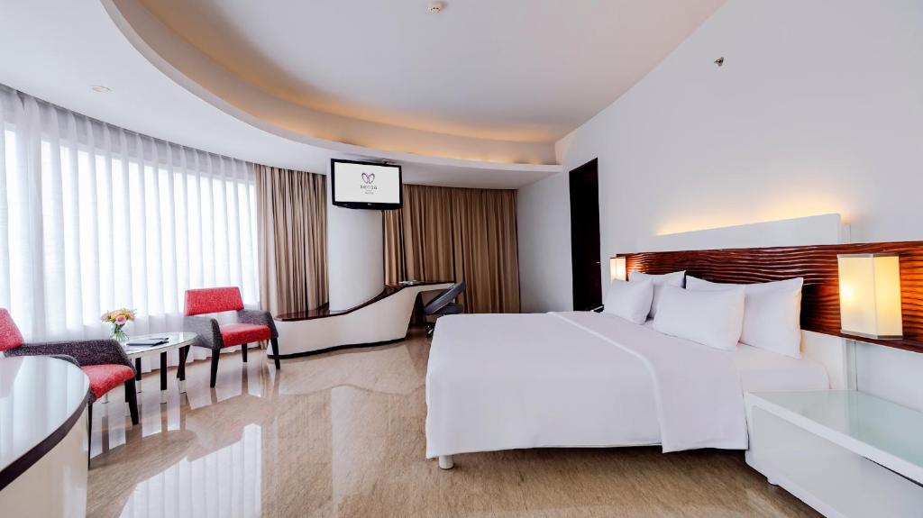 Letto o letti in una camera di Sensa Hotel Bandung
