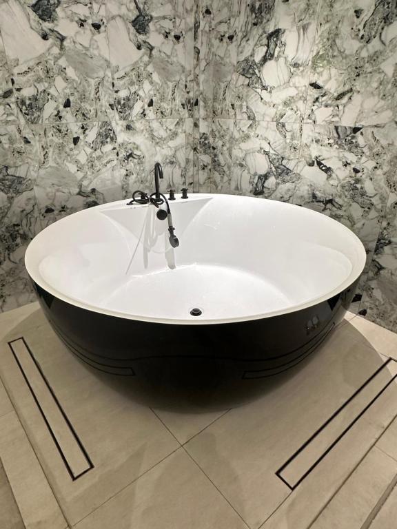 Koupelna v ubytování YUSU Hotel 羽宿酒店