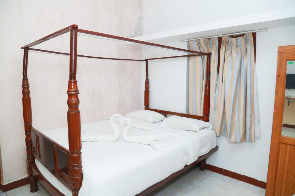 Letto o letti in una camera di Rainforest villa
