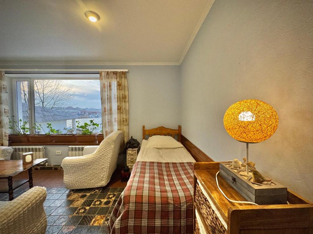 Postel nebo postele na pokoji v ubytování Art Hotel Sevan
