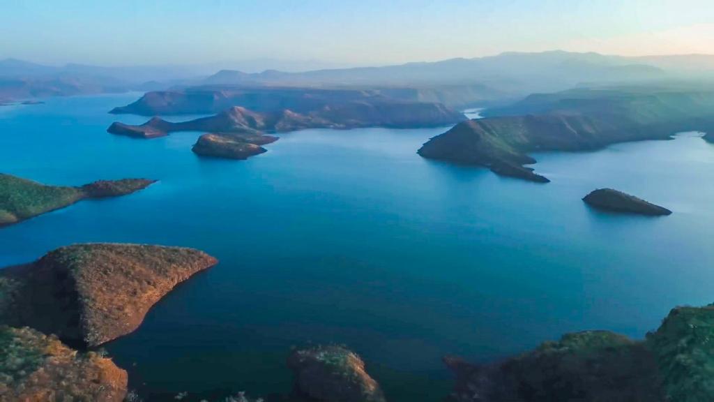 an aerial view of a large lake with rocks at Halala Kella Eco Lodge in Zīma