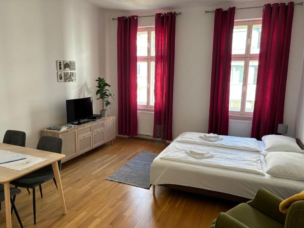 Posteľ alebo postele v izbe v ubytovaní Casa Nostra - Helle Wohnung - direkt am Augarten