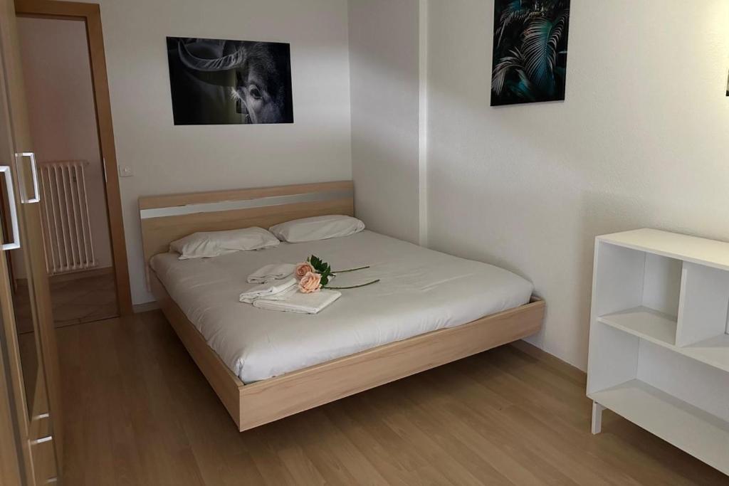 Postel nebo postele na pokoji v ubytování Lugano Bay View