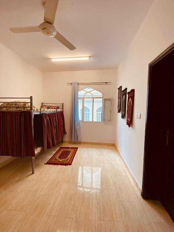 Postel nebo postele na pokoji v ubytování Heritage Hostel Muscat