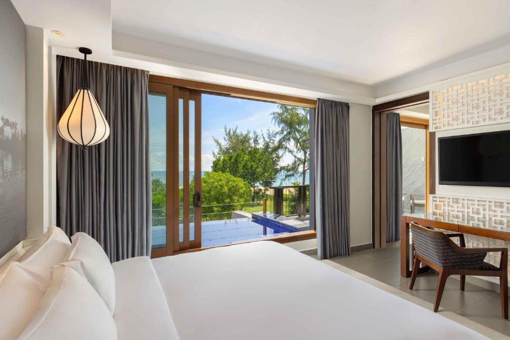 Suite Junior có Giường cỡ King Nhìn ra Biển và Hồ bơi riêng