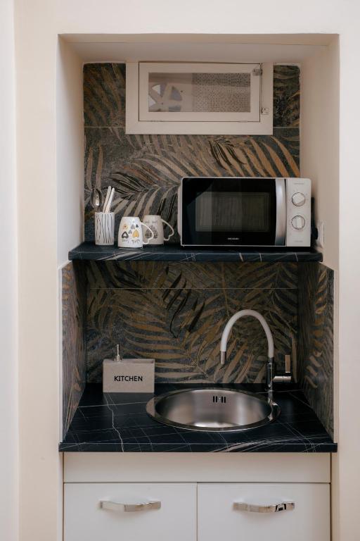 Kuchyň nebo kuchyňský kout v ubytování Suite 23