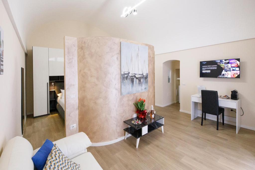 TV a/nebo společenská místnost v ubytování Suite 23
