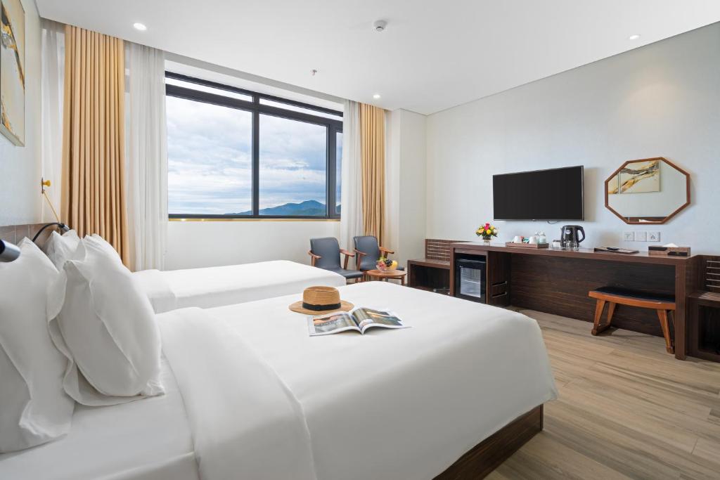 TV a/nebo společenská místnost v ubytování Emerald Bay Hotel & Spa Nha Trang