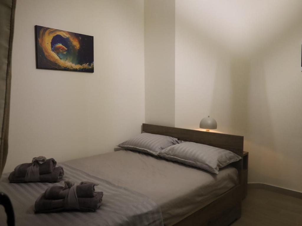 Postel nebo postele na pokoji v ubytování Xanthi BnB3